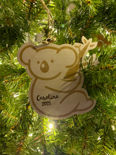 Custom engraved and 3d Dog Paw Ornament, Personalized with Pets name, Christmas tree decoration or gift for the holidays
